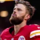 BREAKING Kansas City kicker Harrison Butker Teary-eyed announced sudden retirement , End contract with the chiefs over this ” I don’t feel love “ Butker later addressed the women in the audience, saying that his wife embraced “one of the most important titles of all. Homemaker.”